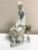 A Lladro figurine : New Shepherdess, model 4576, height 24 cm, boxed.