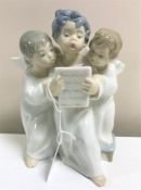 A Lladro figurine : Angels Group, model 4542, height 18 cm, boxed.