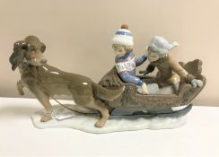 A Lladro figurine : Sleigh Ride, model 5037, height 26 cm, boxed.