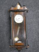 An early 20th century mahogany cased eight day wall clock