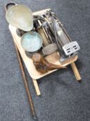 A 'Glass Queen' wash board and a tray of two vintage foot pumps, kitchen scales,