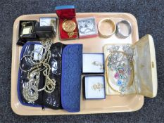 A tray containing assorted costume jewellery including 14ct gold plated necklaces