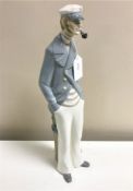 A Lladro figurine : Sea Captain, model 4621, height 37 cm, boxed.