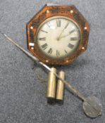 An antique time-piece with mother of pearl inlaid case together with two weights and pendulum