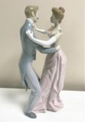 A Lladro figurine : Anniversary Dance, model 1372, height 31 cm, unboxed.