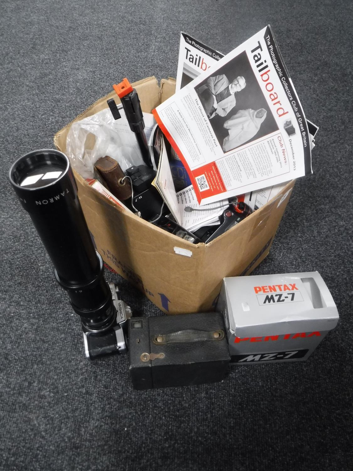 A box of cameras including Yashica, Pentax etc,