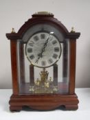 A Kundo quartz mantel clock
