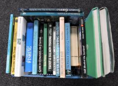 A crate of books relating to fishing