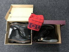 A boxed pair of gent's Dr Martens boots, size 6.