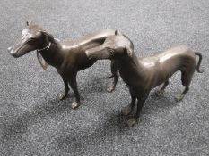 A pair of cast iron greyhound figures