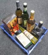 A basket of seven bottles of alcohol - bottle of Pinie Royal Scotch whiskey,