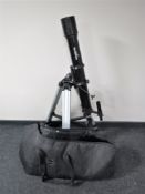 A Sky Watcher telescope on stand with carry bag