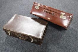Two vintage leather cases containing lady's hand bags