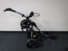 A Motocaddy golf trolley with extra wheels (no battery)