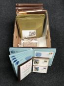 A box of albums of First Day Covers,