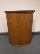 A Victorian double door hanging corner cabinet