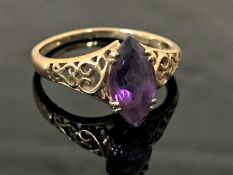 A 9ct gold marquise cut amethyst ring, size P.