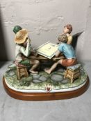 Cortesi for Capodimonte - The Cheats, on mahogany plinth, 47.