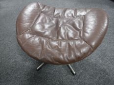 A mid 20th century Danish leather footstool on chrome base