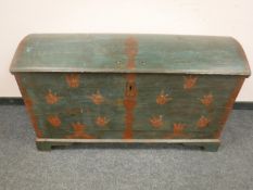 A 19th century domed topped painted trunk,
