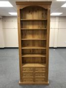 A set of pine open shelves,