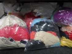 Nine bags of lady's formal dresses, tagged,