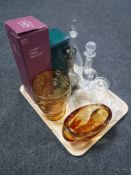 A tray of boxed and unboxed glass decanters, two lidded preserve pots,
