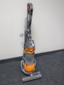 A Dyson DC 25 upright vacuum cleaner