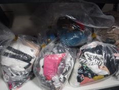 Ten bags of assorted lady's clothing with retail tags - new