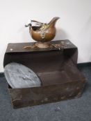 A vintage leather case containing oak barrel lid,