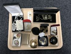 A collection of costume jewellery including compacts etc,