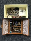 A leather jewellery box containing costume jewellery, silver lidded scent bottle, match holder,