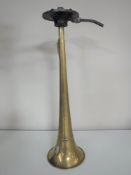 A vintage brass horn from a boat