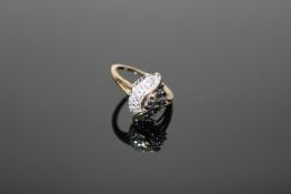 A 9ct gold sapphire and diamond cluster ring,