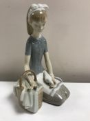 A Lladro figurine : Dove on the Lap, model 4909, height 20 cm, boxed.