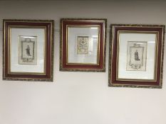 A set of three reproduction gilt framed pictures depicting coats of arms and monarchs