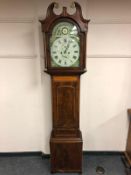 A 19th century inlaid mahogany longcased clock with painted dial and two weights and pendulum.