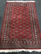 A fringed Bokhara design rug,