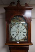 A Victorian mahogany longcase clock with painted dial