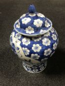 An antique Chinese blue and white lidded urn (a/f)