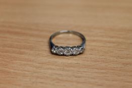 A five stone diamond ring set in 18ct white gold and platinum CONDITION REPORT: The