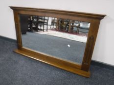 A period style oak bevelled overmantel mirror