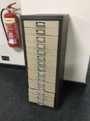 A metal multi drawer chest,