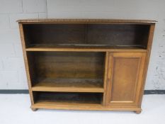 An early 20th century oak sideboard/bookcase