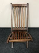 A folding steamer style chair