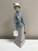 A Lladro figurine : Rose Lady, model 4999, height 31 cm, boxed.
