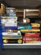 A large quantity of board games and jigsaw puzzles