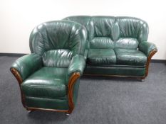 A green leather three seater settee with matching armchair