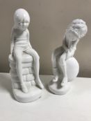 Two Spode plain white figurines designed by Pauline Shone : Jane and James, heights 21 cm and 19 cm.