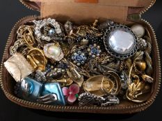 A vintage case of costume jewellery,